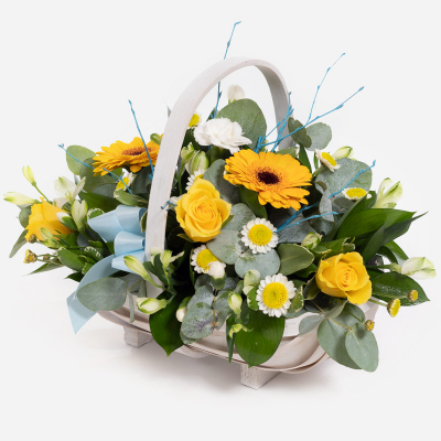 Blue Baby Boy Basket 
 - A floral basket overflowing with yellow and white flowers, neatly arranged with foliage. 
