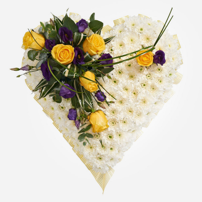 Heart SYM-324 - White Massed Heart with Yellow & Purple Spray. A beautiful arrangement to send to a funeral.
