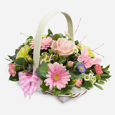 Pretty Perfect Basket - It’s pretty. It’s perfect. A floral basket overflowing with pastel-shaded picks, neatly arranged with foliage and topped with a bow*. An ideal gift, whatever the occasion. (*Available in pink or blue)